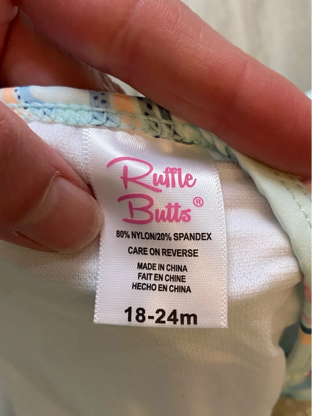 NWT RuffleButts Pastel Chase the Rainbow Bow Top Skirted Bikini girls 18-24M